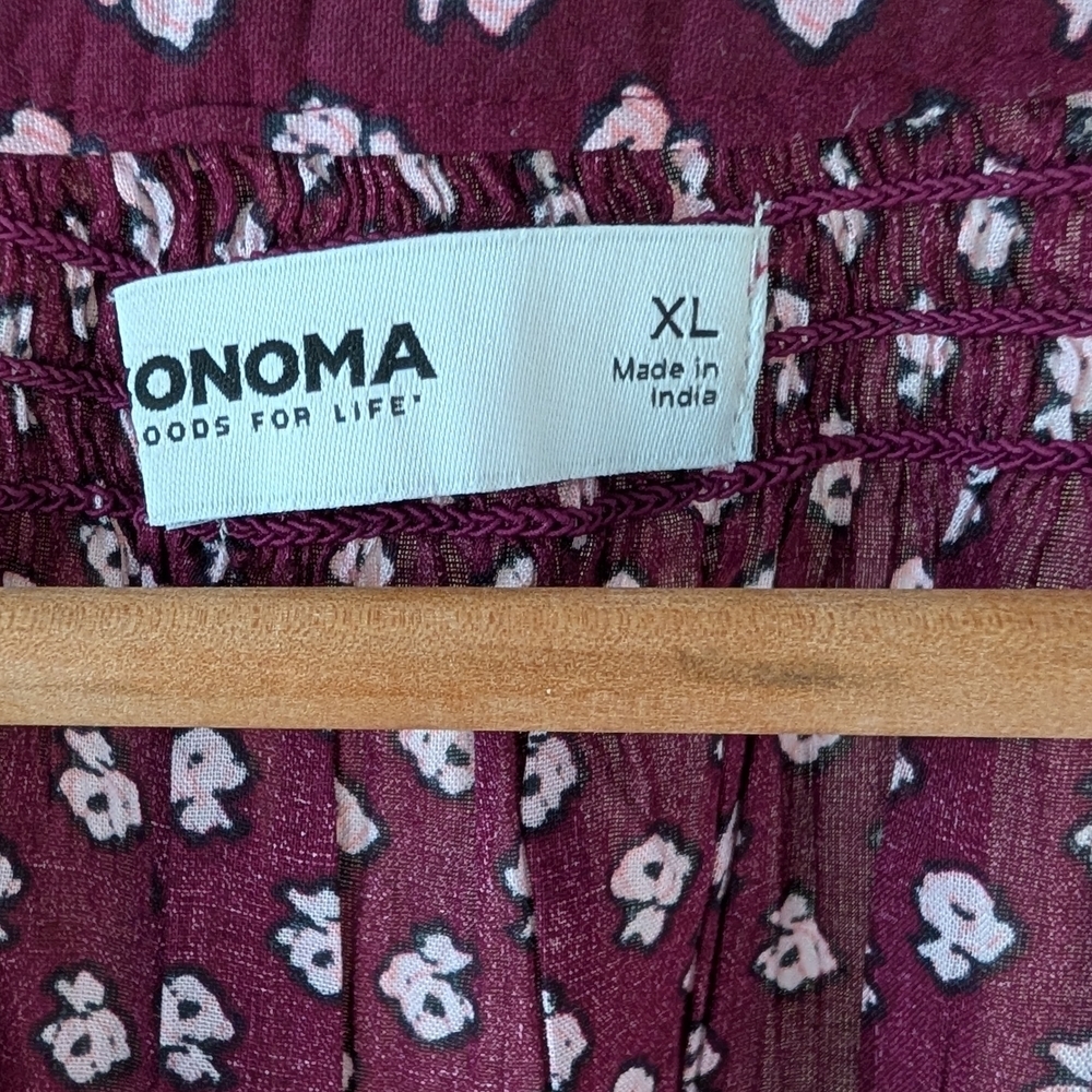 Floral Smocked Wrist Henley with 1/4 Button Down Closure In Plum - Picture 7 of 8